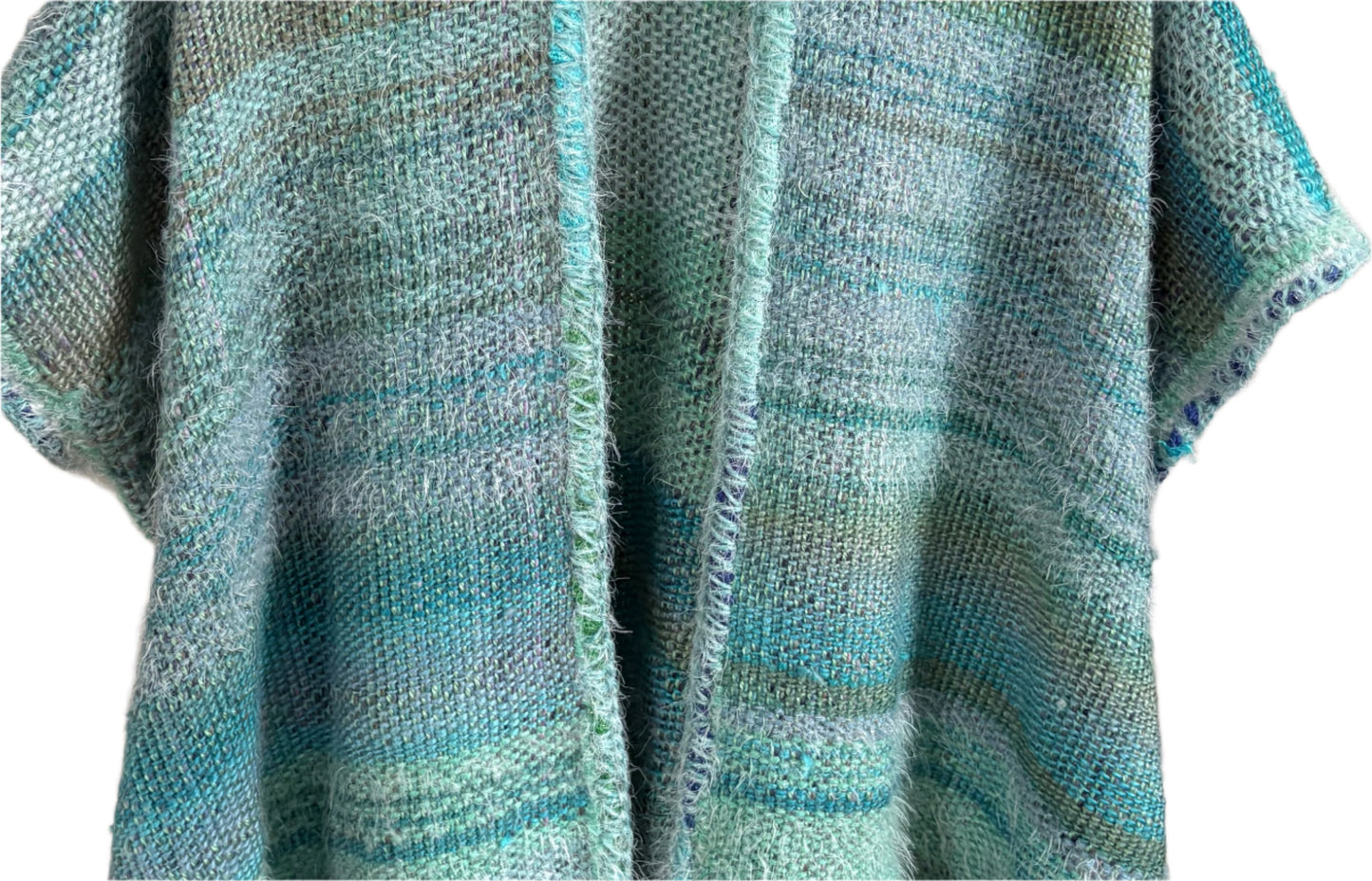 Handwoven Boho style poncho in the Sea Shades