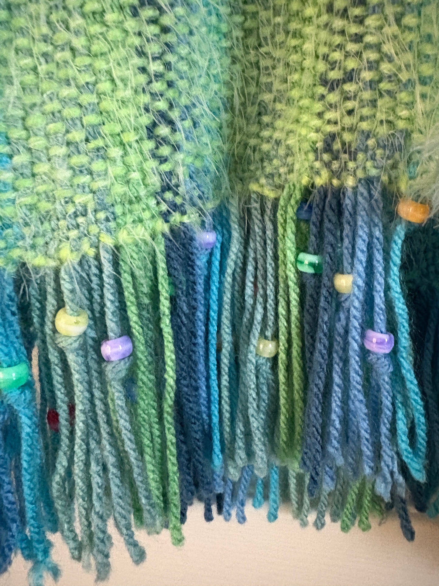 Handwoven mid length sleeveless vest