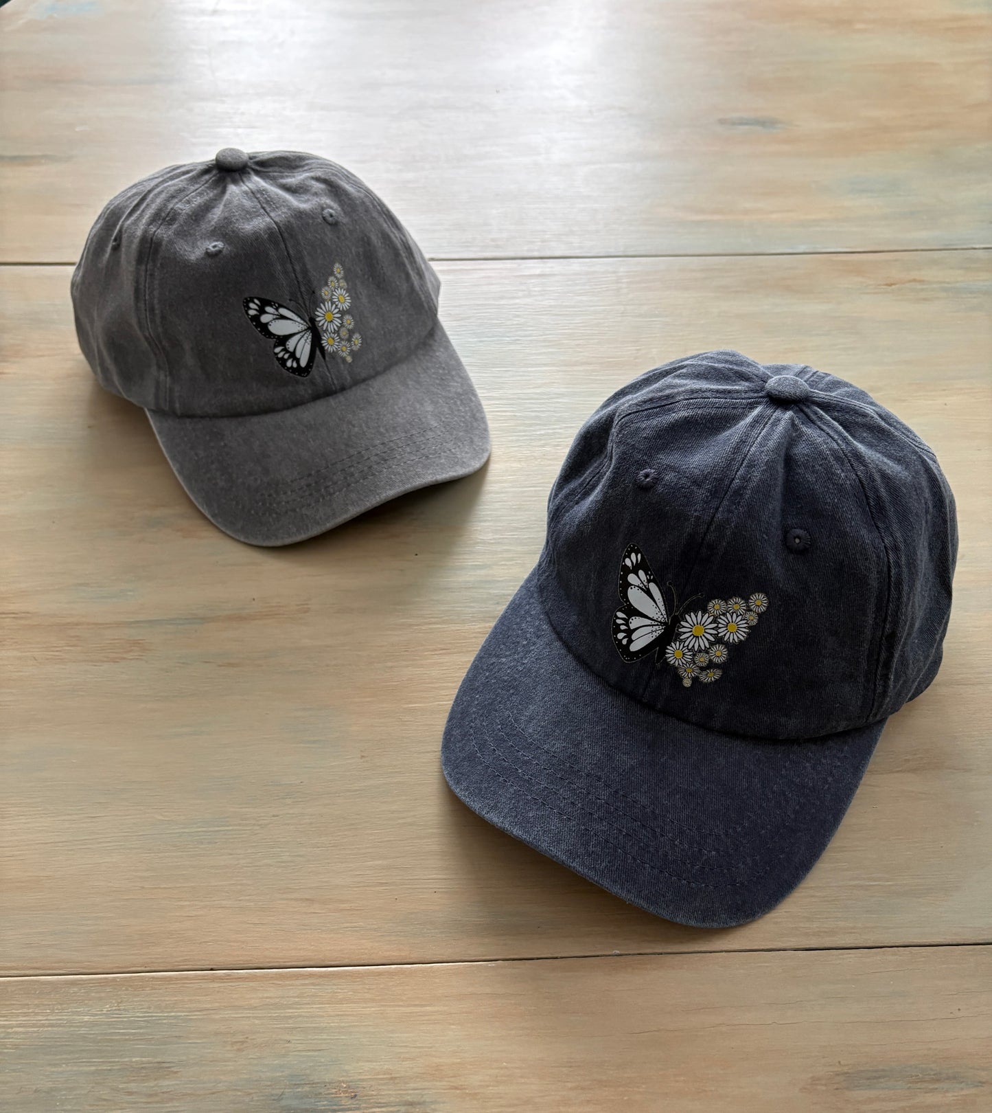 Baseball style cap with Butterfly/flower design